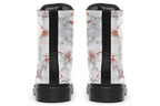 Boots featuring a grey marble-like pattern with accents of blush pink throughout the marble design