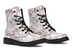 Boots featuring a grey marble-like pattern with accents of blush pink throughout the marble design