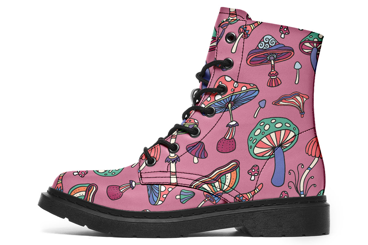 Mismatched boots with retro mushroom pattern. One boot is mint green, the other is pink.