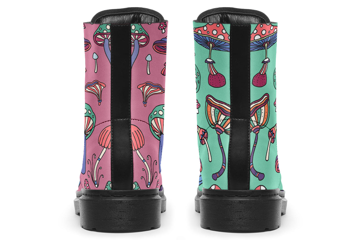 Mismatched boots with retro mushroom pattern. One boot is mint green, the other is pink.