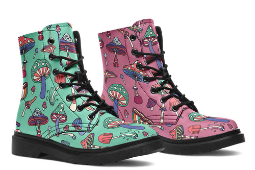 Mismatched boots with retro mushroom pattern. One boot is mint green, the other is pink.