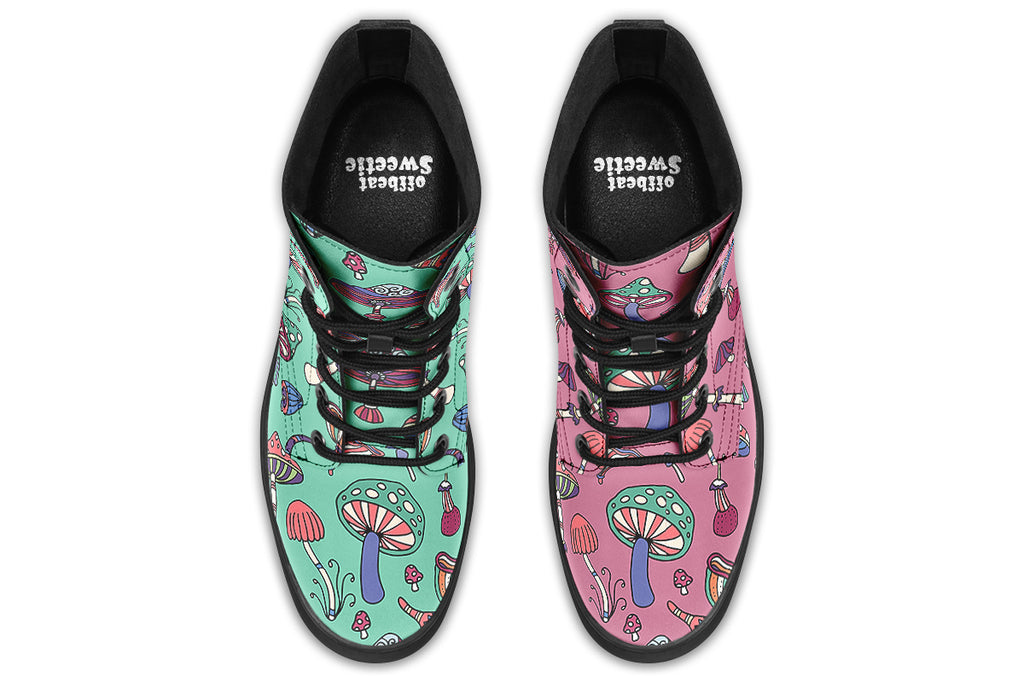 Mismatched boots with retro mushroom pattern. One boot is mint green, the other is pink.