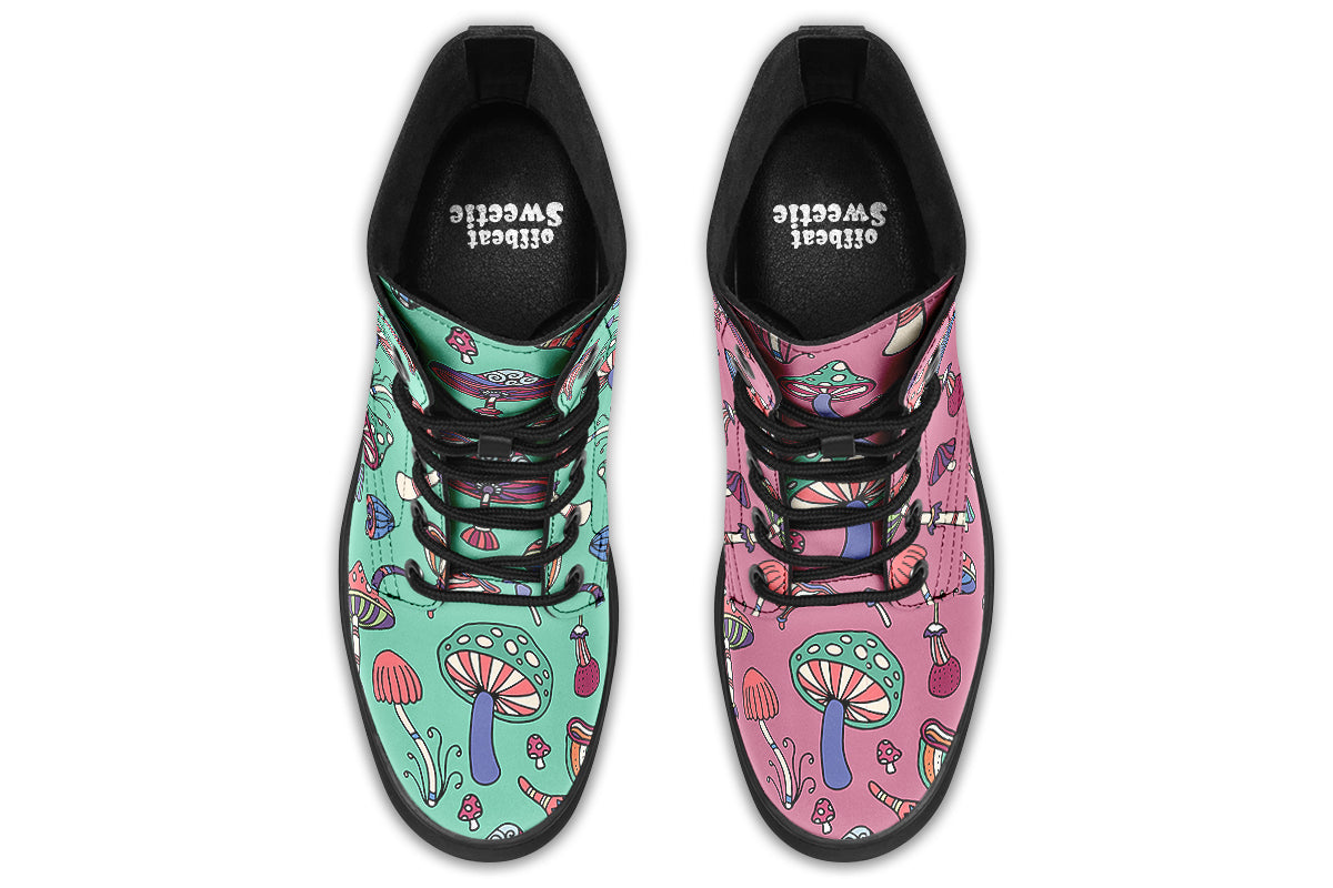 Mismatched boots with retro mushroom pattern. One boot is mint green, the other is pink.
