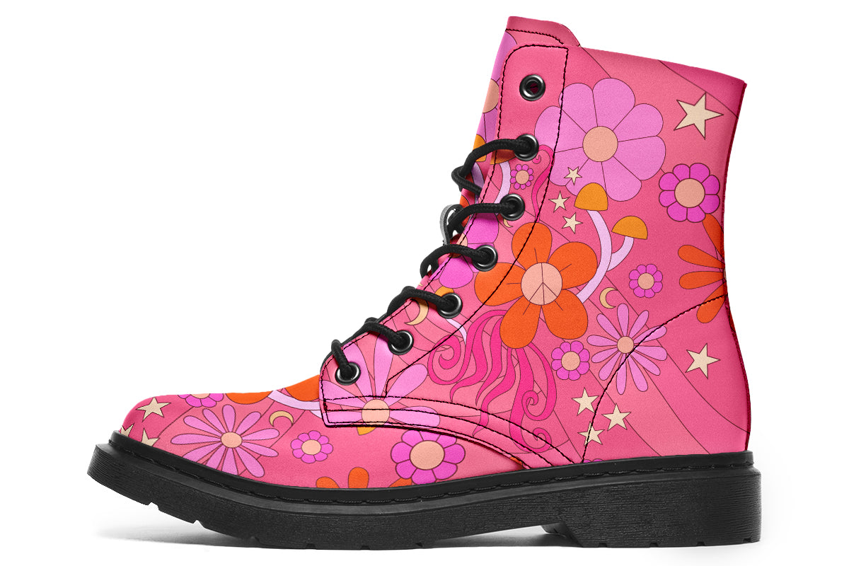 Mismatched boots featuring a retro floral design. One is pink and the other is orange.