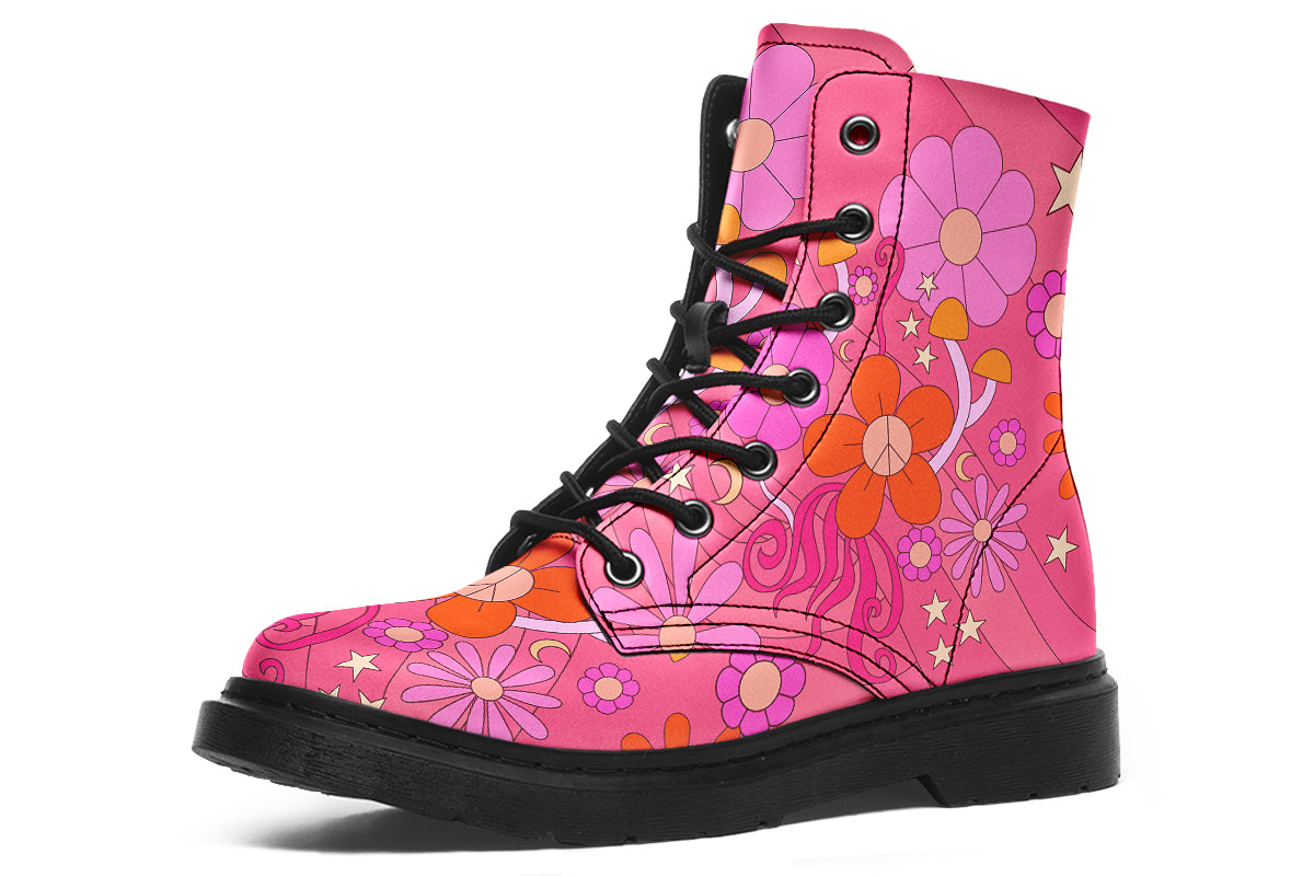 Mismatched boots featuring a retro floral design. One is pink and the other is orange.