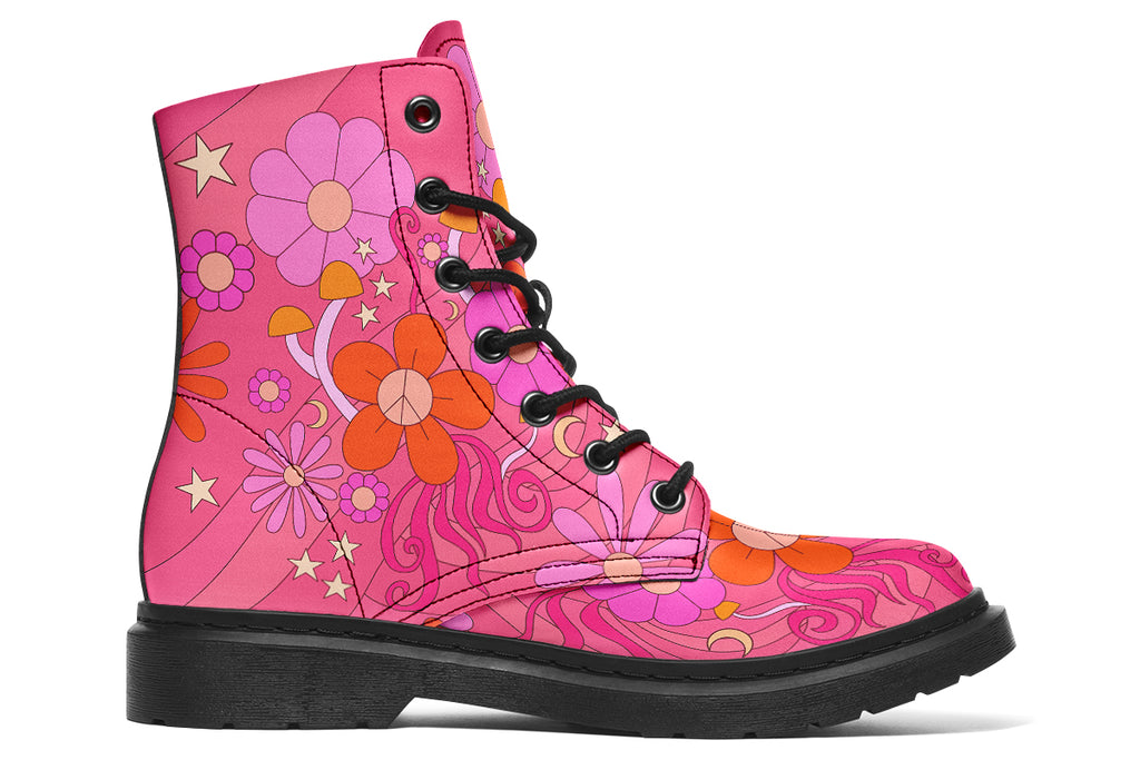 Mismatched boots featuring a retro floral design. One is pink and the other is orange.