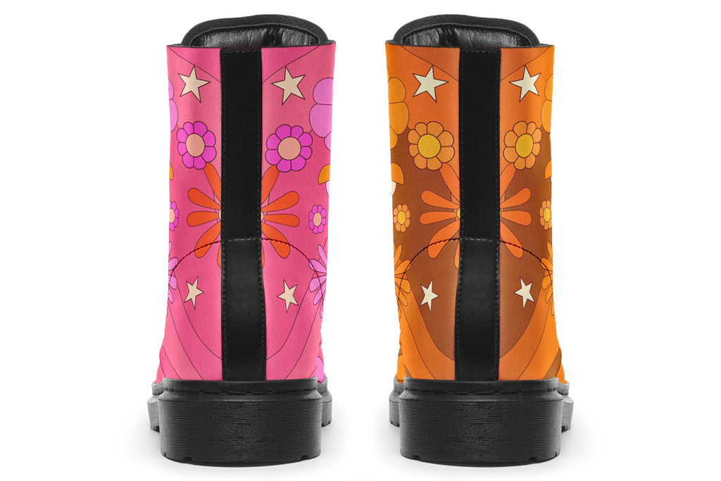 Mismatched boots featuring a retro floral design. One is pink and the other is orange.