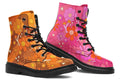 Mismatched boots featuring a retro floral design. One is pink and the other is orange.