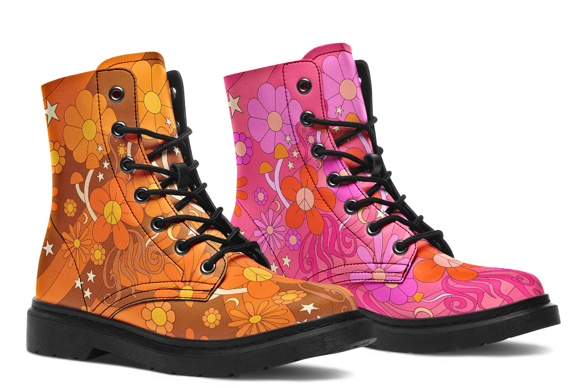Mismatched boots featuring a retro floral design. One is pink and the other is orange.