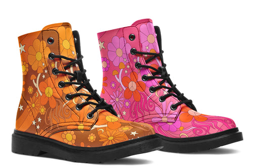 Mismatched boots featuring a retro floral design. One is pink and the other is orange.