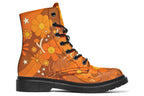 Orange boots featuring a retro floral design