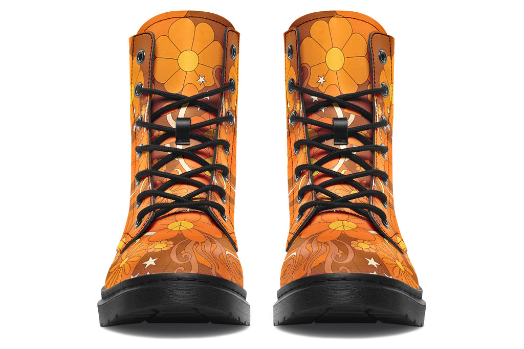 Orange boots featuring a retro floral design