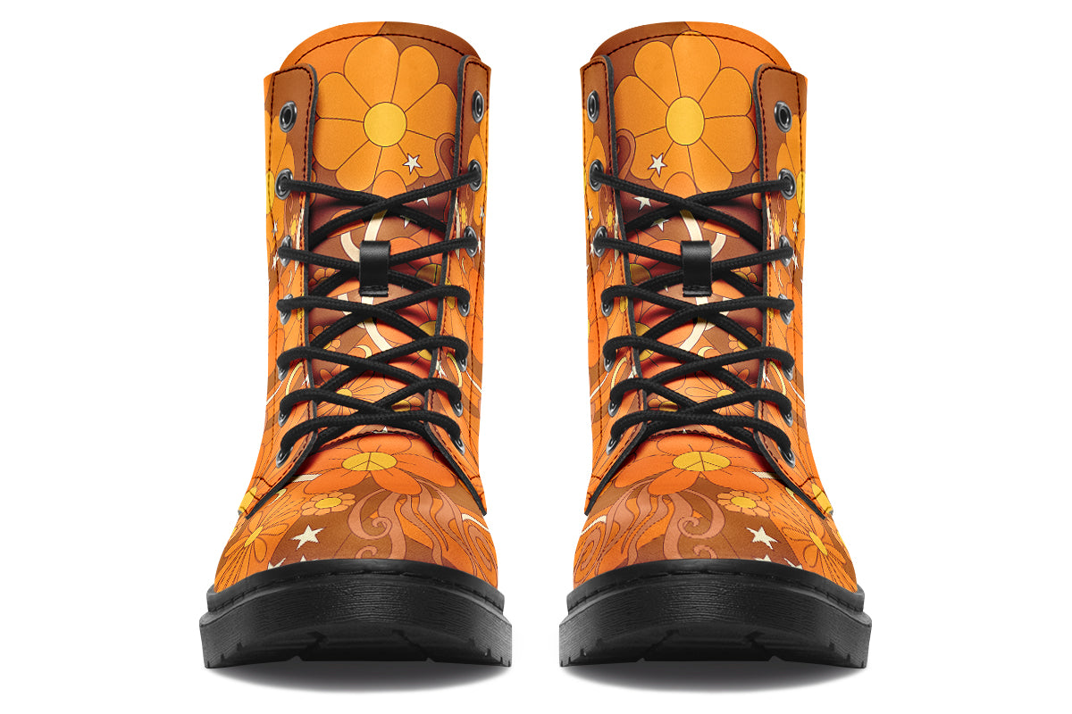Orange boots featuring a retro floral design