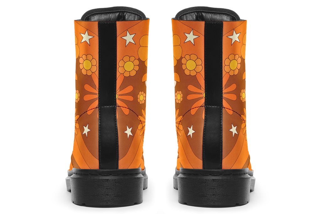 Orange boots featuring a retro floral design