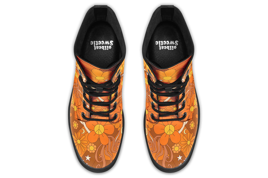 Orange boots featuring a retro floral design