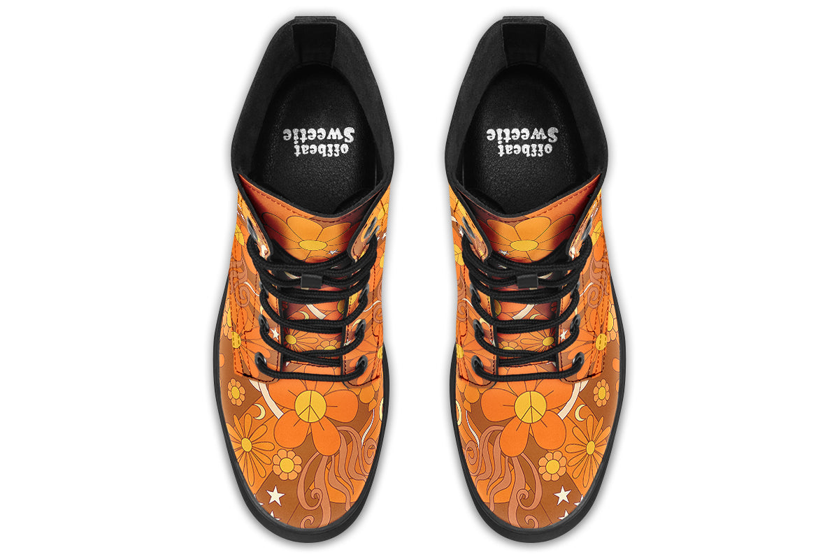 Orange boots featuring a retro floral design