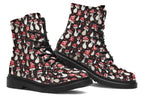 Black boots with a pattern of red and white mushrooms all over them