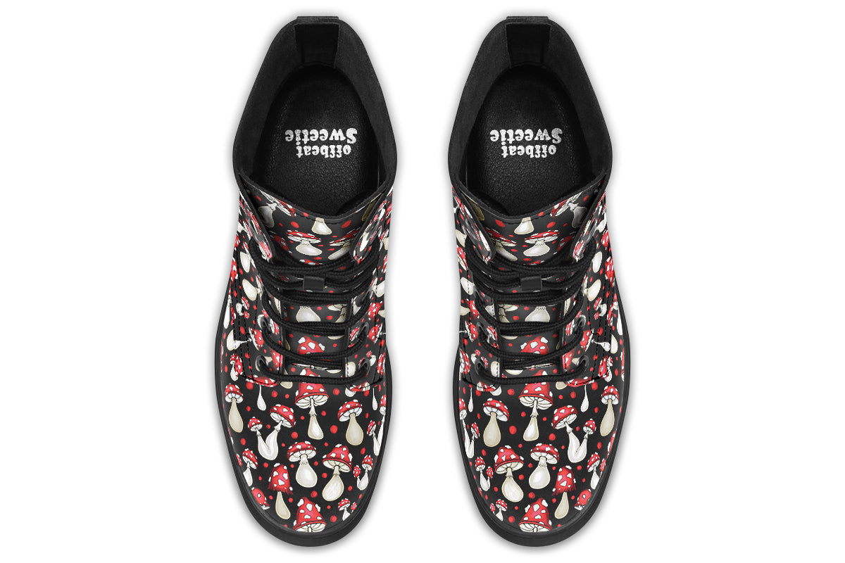 Black boots with a pattern of red and white mushrooms all over them