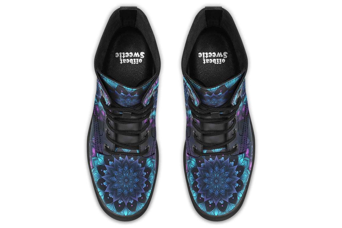 Boots featuring a mandala pattern in shades of blue and purple, on a black background