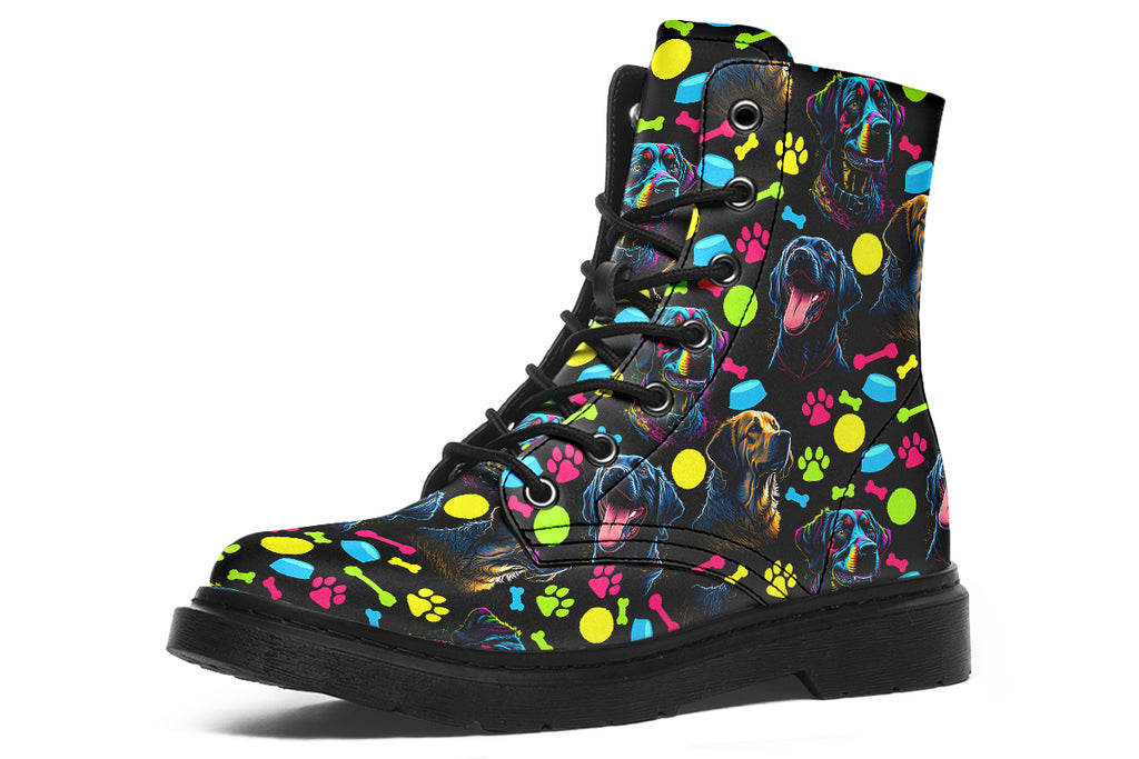 Black boots with a repetitive pattern of dog faces and neon paw prints, dog bowls and dog bones.