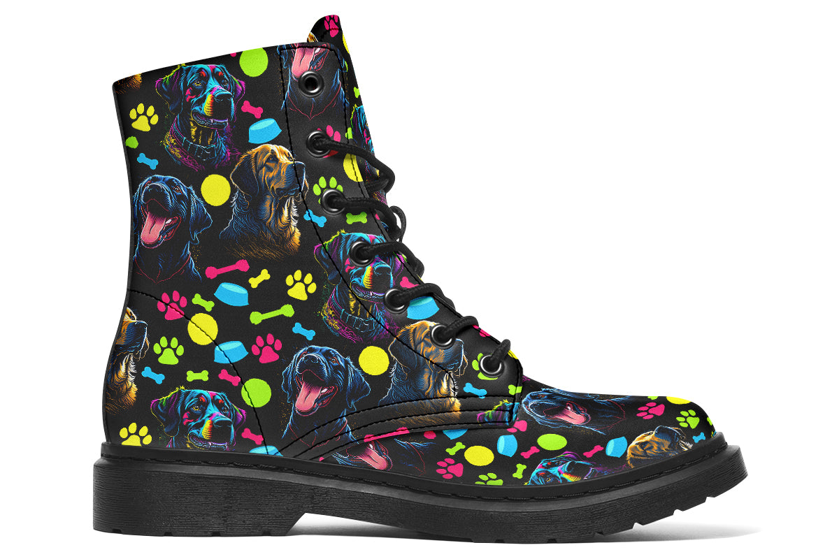 Black boots with a repetitive pattern of dog faces and neon paw prints, dog bowls and dog bones.