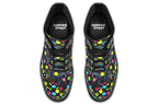 Black boots with a repetitive pattern of dog faces and neon paw prints, dog bowls and dog bones.