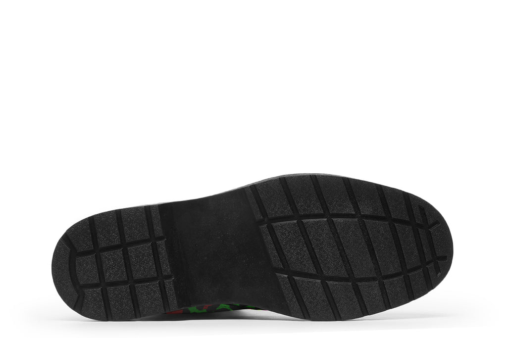 Neon green boots with a neon pink leopard print design