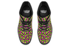 Neon green boots with a neon pink leopard print design