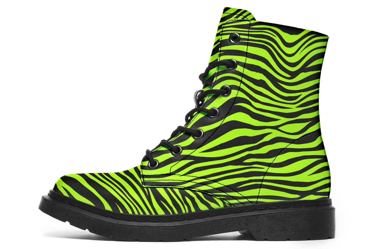 Boots featuring a zebra print in black and neon green