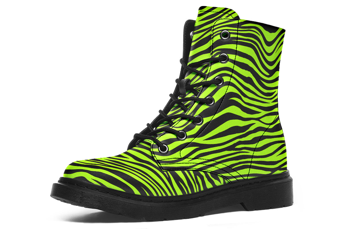 Boots featuring a zebra print in black and neon green