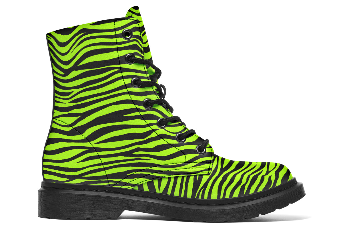 Boots featuring a zebra print in black and neon green