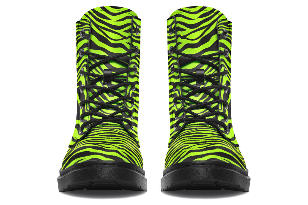 Boots featuring a zebra print in black and neon green