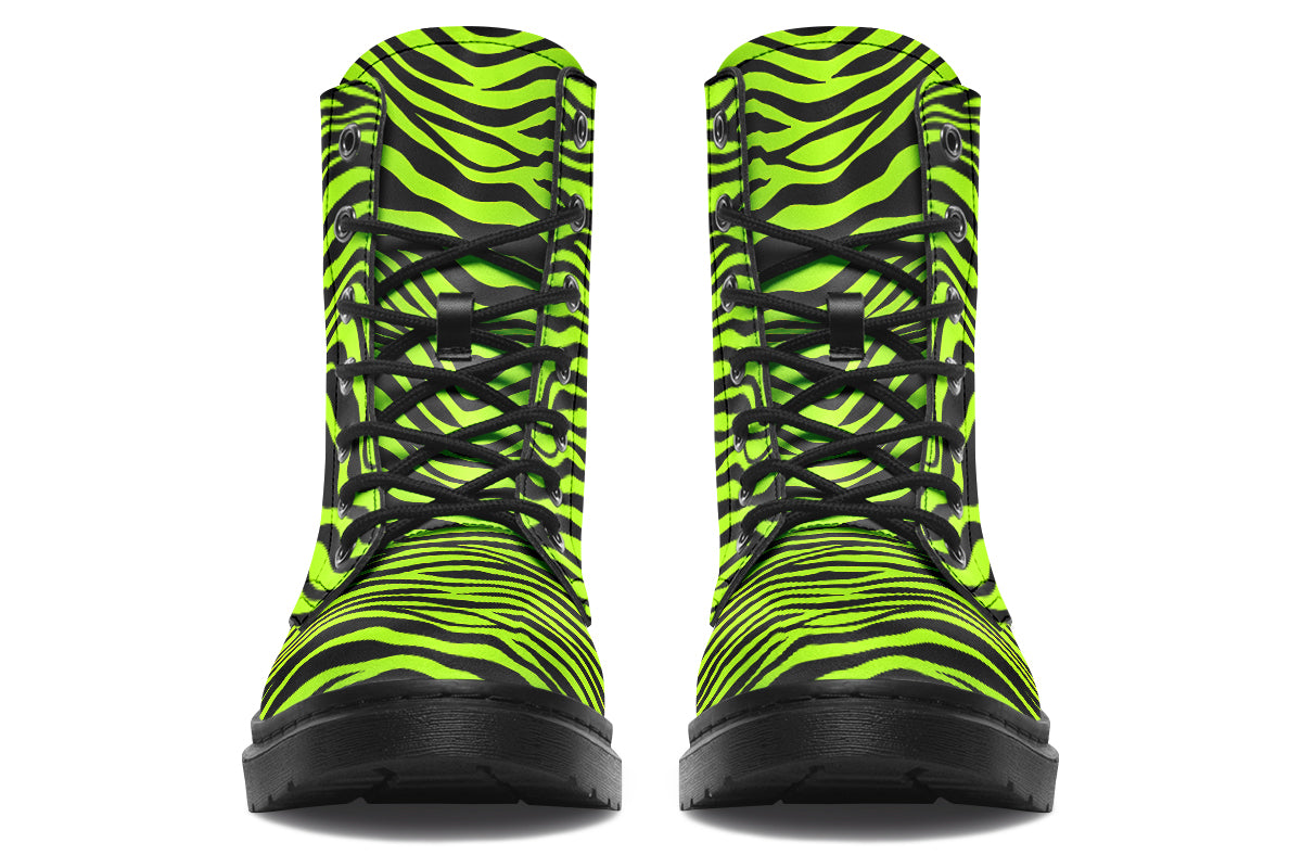 Boots featuring a zebra print in black and neon green