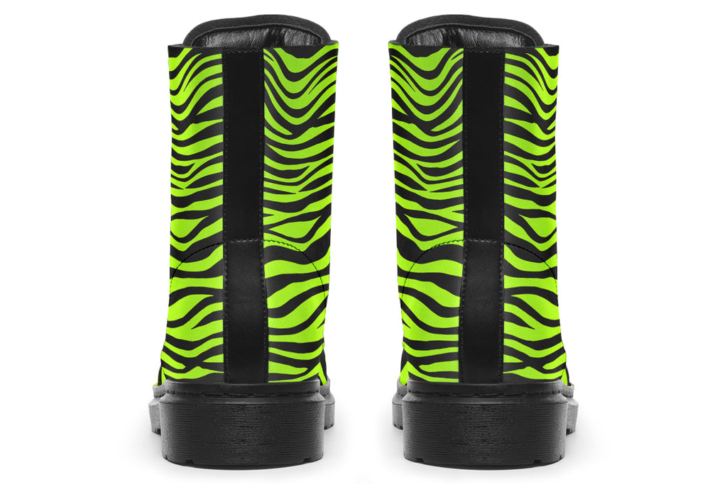 Boots featuring a zebra print in black and neon green