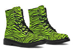 Boots featuring a zebra print in black and neon green