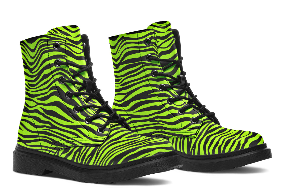 Boots featuring a zebra print in black and neon green