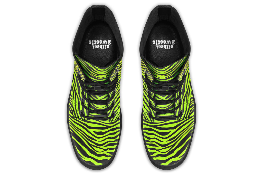 Boots featuring a zebra print in black and neon green