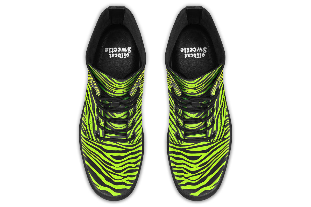 Boots featuring a zebra print in black and neon green