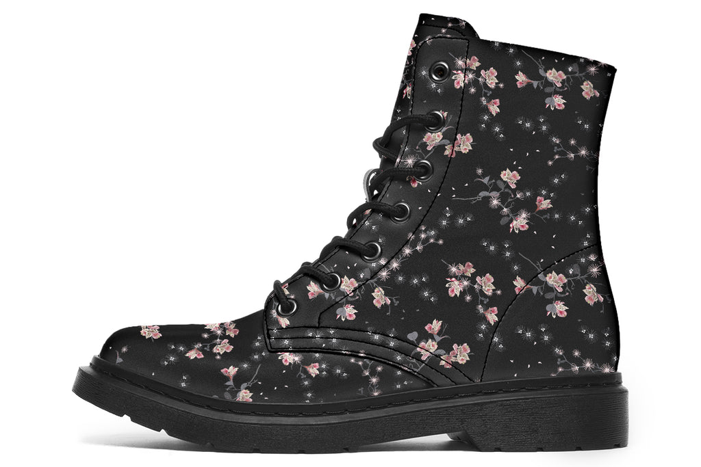 Black boots with a white floral pattern