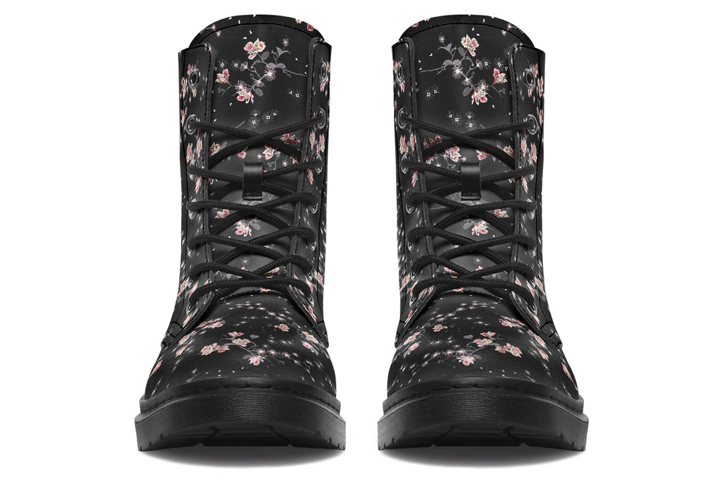 Black boots with a white floral pattern