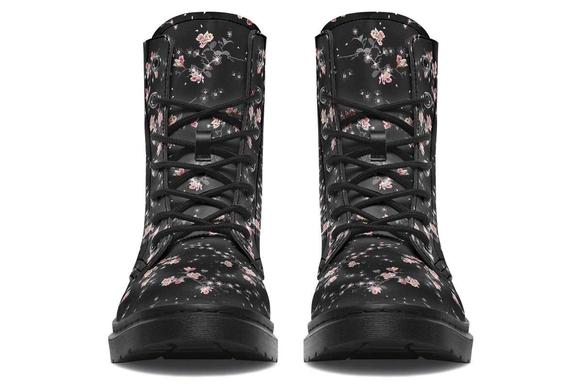 Black boots with a white floral pattern