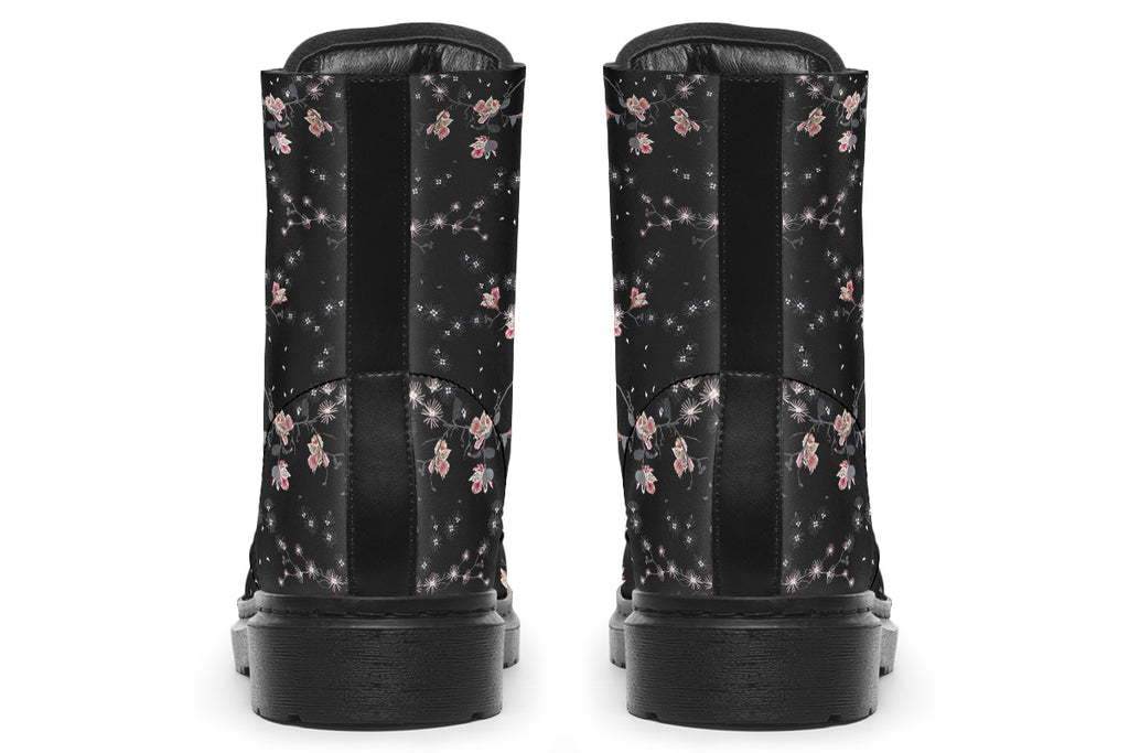 Black boots with a white floral pattern