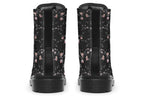 Black boots with a white floral pattern