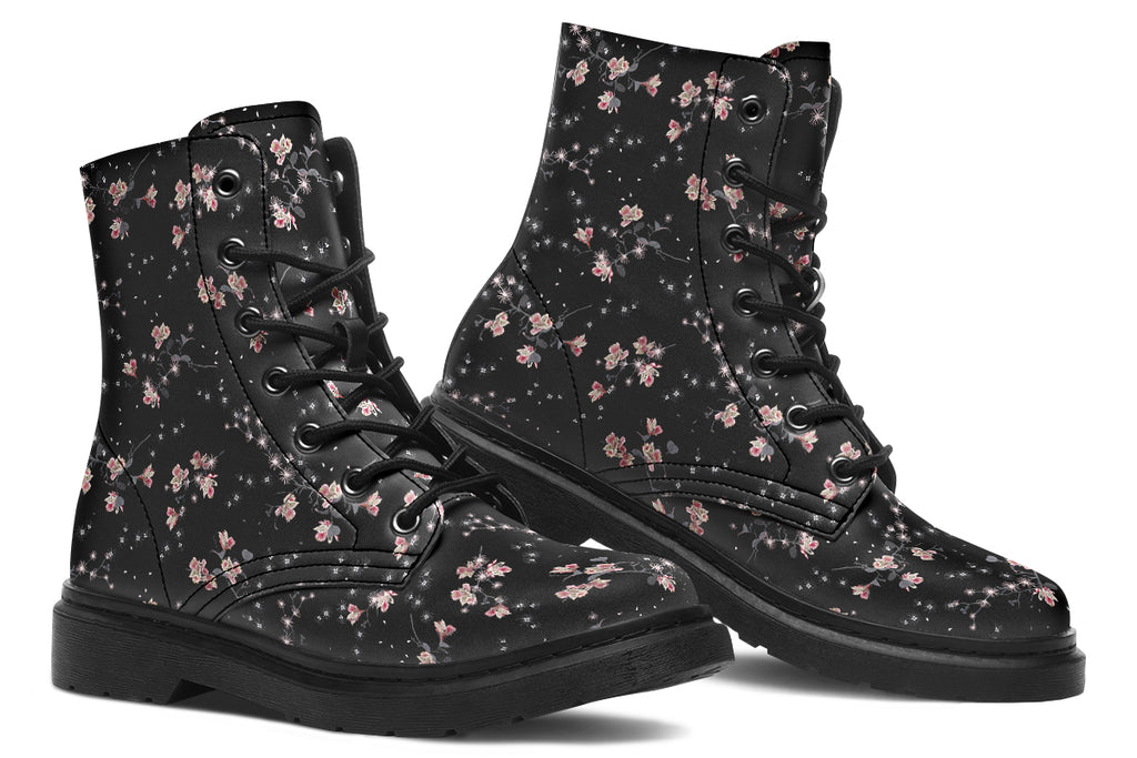 Black boots with a white floral pattern