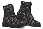 Black boots with a white floral pattern