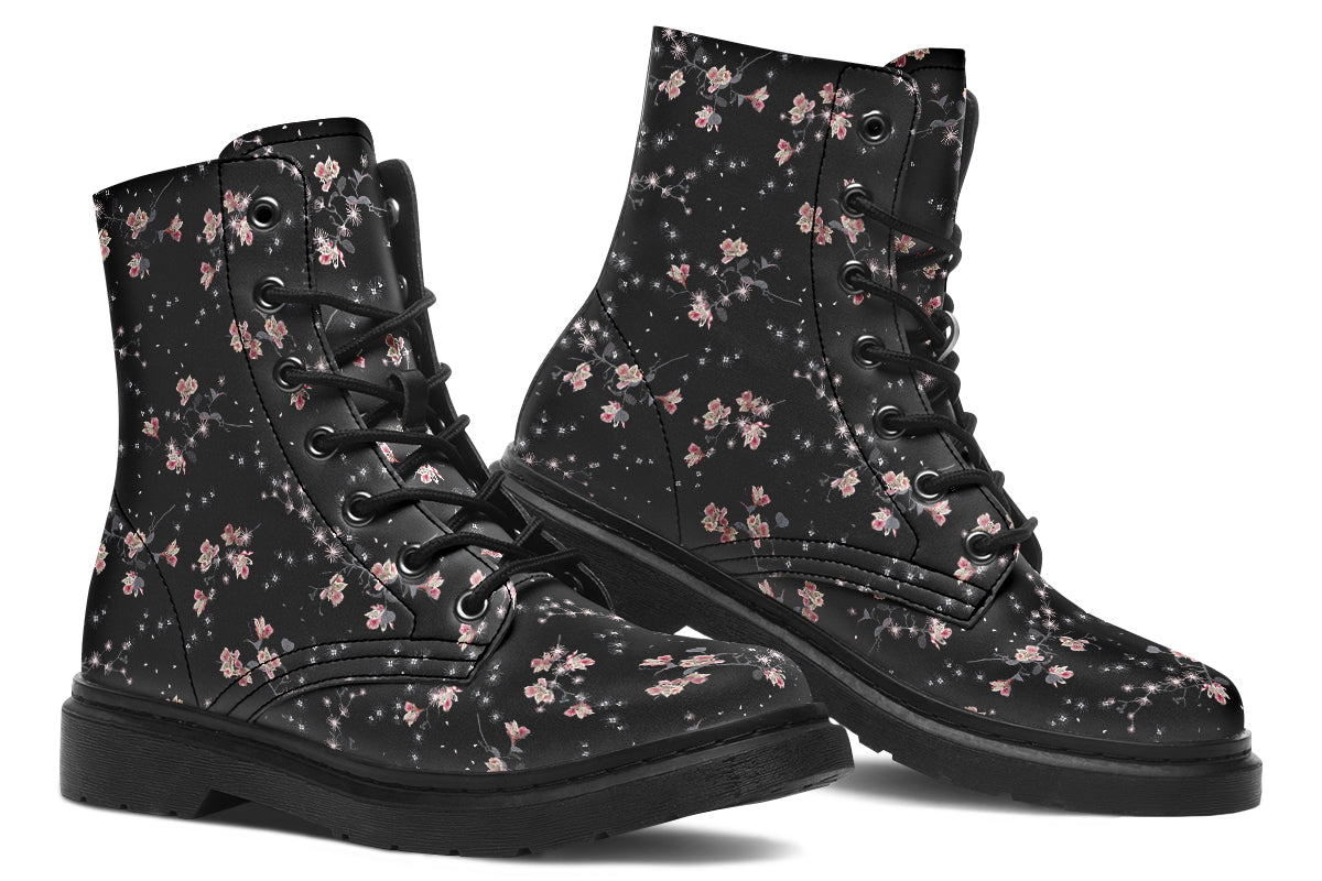 Black boots with a white floral pattern