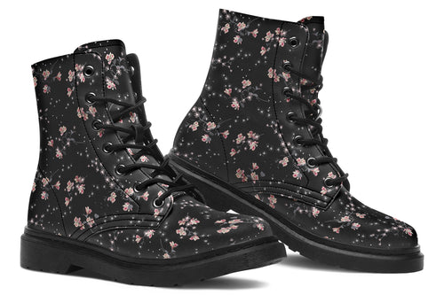 Black boots with a white floral pattern