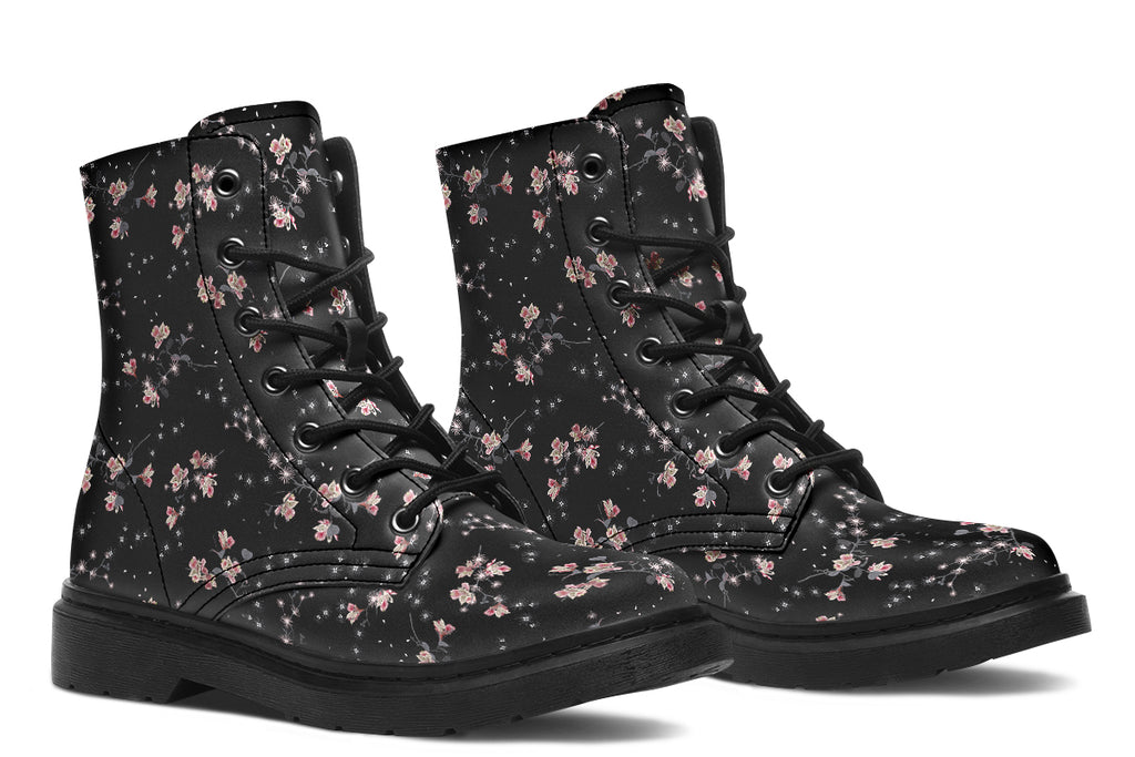 Black boots with a white floral pattern
