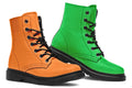 Mismatched boots, one all orange and one all green. Boots have a black sole and black laces.