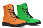 Mismatched boots, one all orange and one all green. Boots have a black sole and black laces.